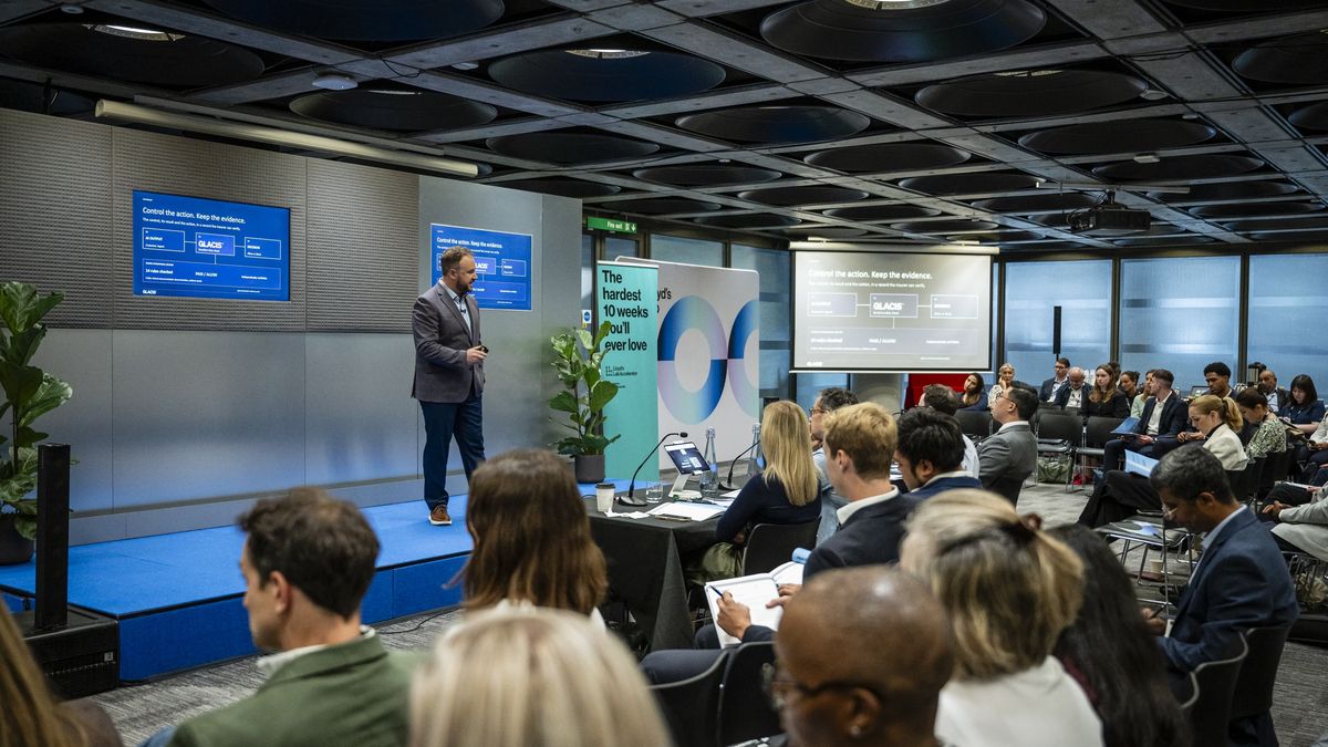 The Pitch Day room at Lloyd’s, seen from the back, with the Glacis pitch on stage